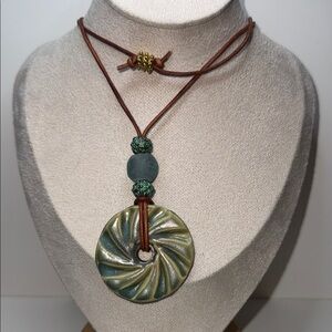 Bohemian ceramic swirled Green and Brown corded Pendant Necklace with sea glass